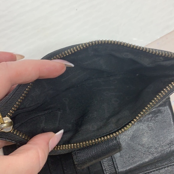Fossil Emory Clutch in black / gold